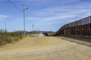US-Mexico border wall looking east from Naco, Arizona.