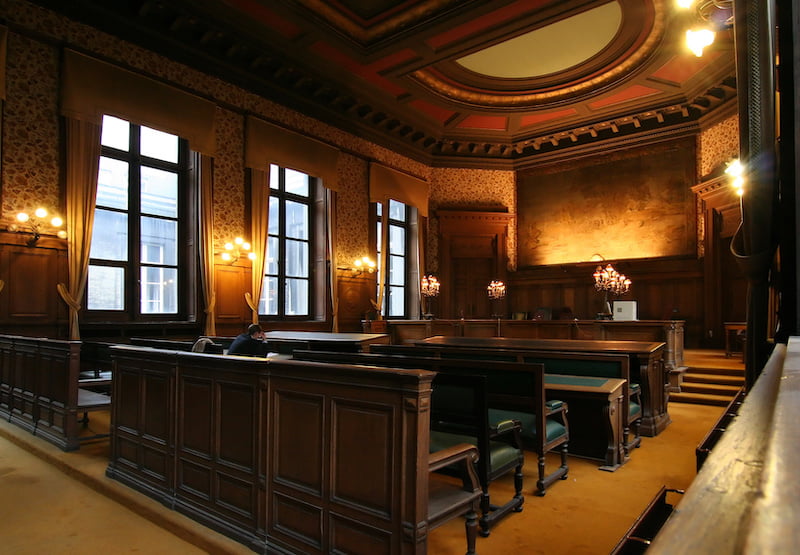 court room, fancy with dim lighting.
