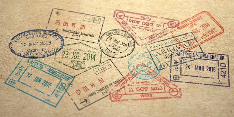 background from different visa stamps on craft paper, 3d illustration
